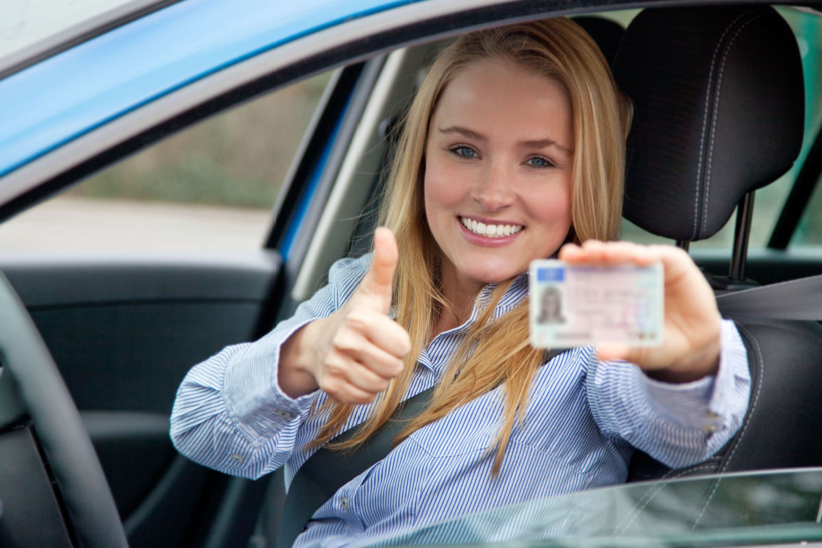 Woman showing her license