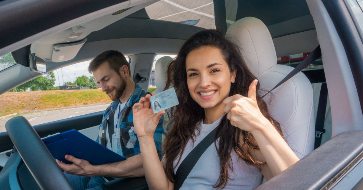 Driver showing her license