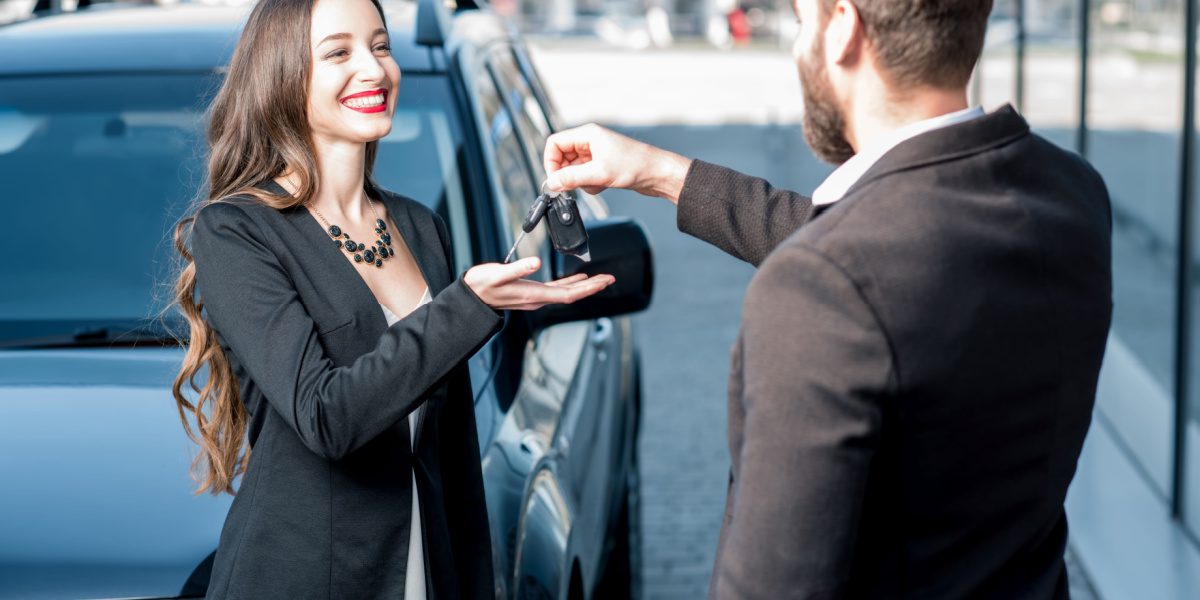 Woman renting a car