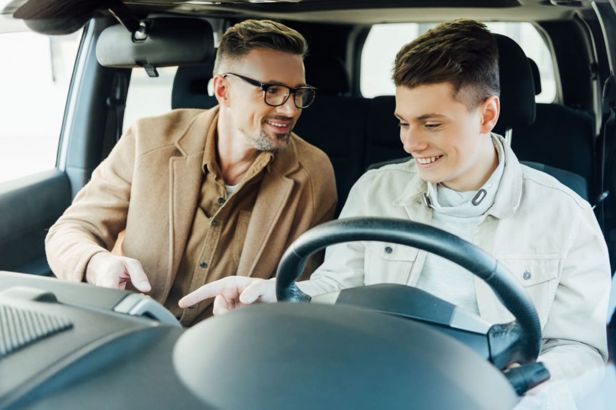 Teen driving a car