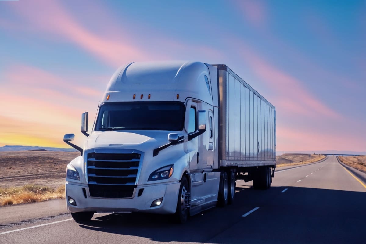 Semi truck transporting goods on the highway