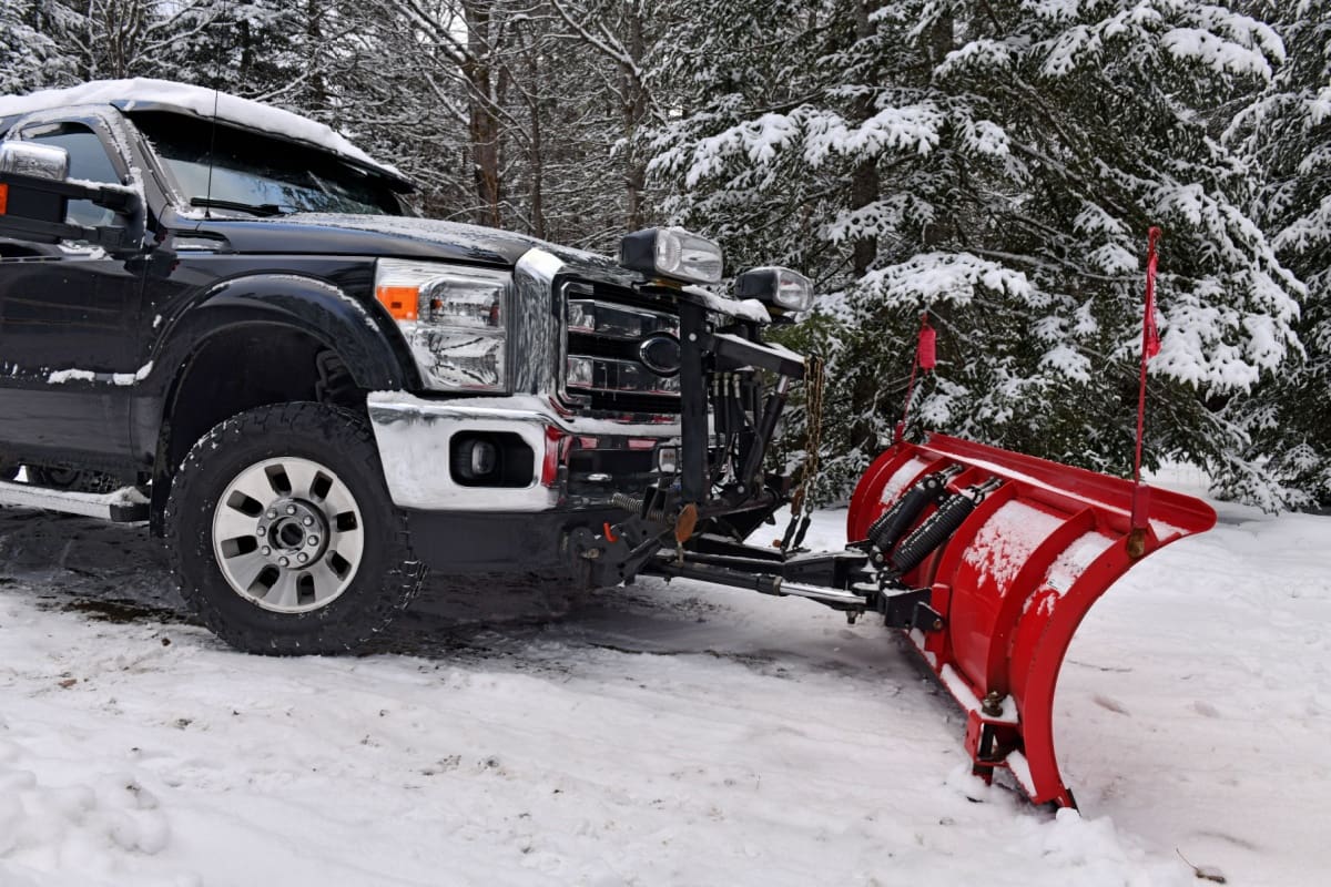 Pickup truck with a snow plow
