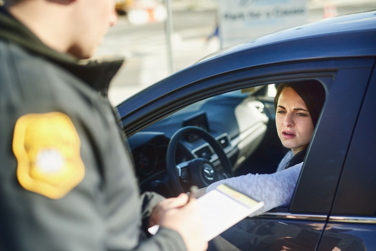 Driver getting a traffic ticket.